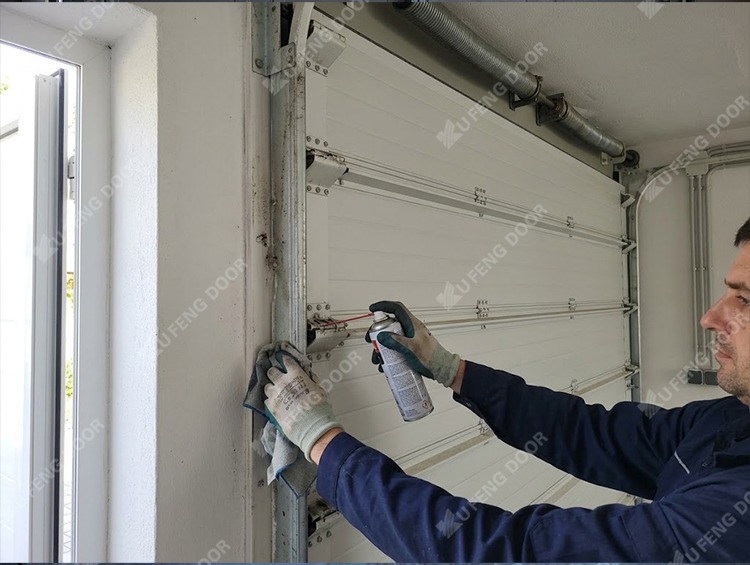 Overhead door roller track lubrication cleaning guide tracks and servicing nylon rollers