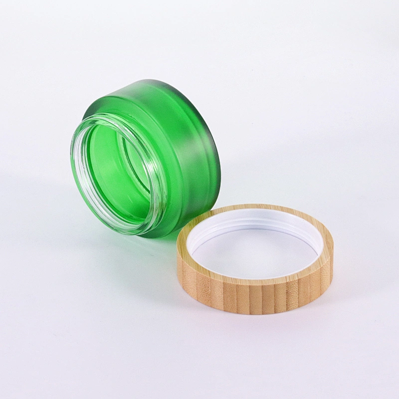 Cosmetic container green frosted glass jar with bamboo wooden lids for face cream jar