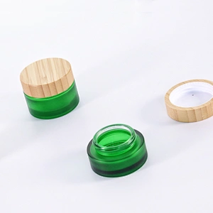 Cosmetic container green frosted glass jar with bamboo wooden lids for face cream jar