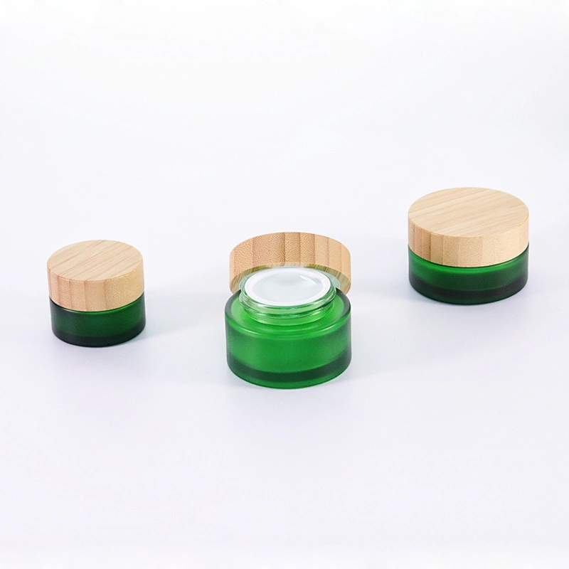Cosmetic container green frosted glass jar with bamboo wooden lids for face cream jar