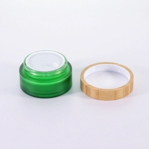 Cosmetic container green frosted glass jar with bamboo wooden lids for face cream jar