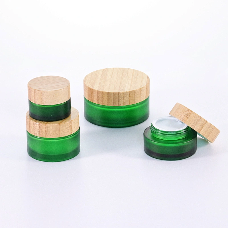 Cosmetic container green frosted glass jar with bamboo wooden lids for face cream jar