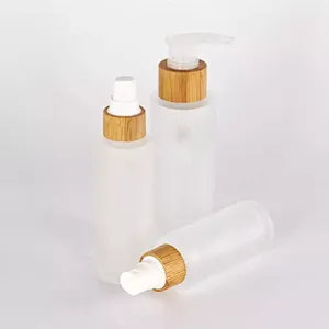 In stock 30ml 50ml 100ml 150ml Round Glass Lotion Bottle with bamboo pump dropper spray Wooden Bamboo cap