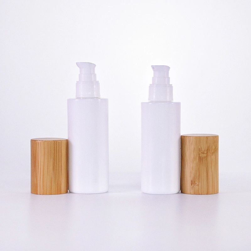 Round glass cosmetic opal glass bottles with wooden lid