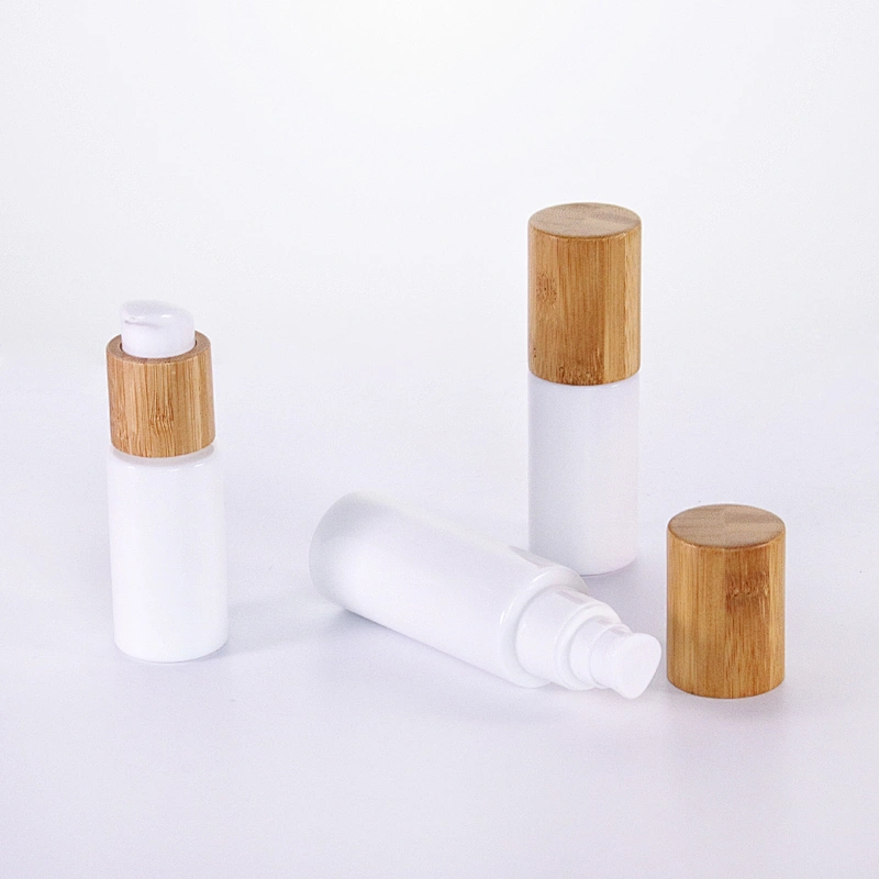 Round glass cosmetic opal glass bottles with wooden lid