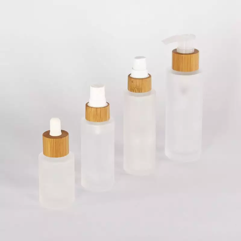 Hot Frosted Clear Round Glass Body Lotion Bottle with bamboo pump dropper spray Wooden Bamboo cap