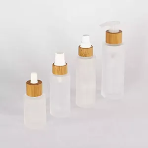 Hot Frosted Clear Round Glass Body Lotion Bottle with bamboo pump dropper spray Wooden Bamboo cap