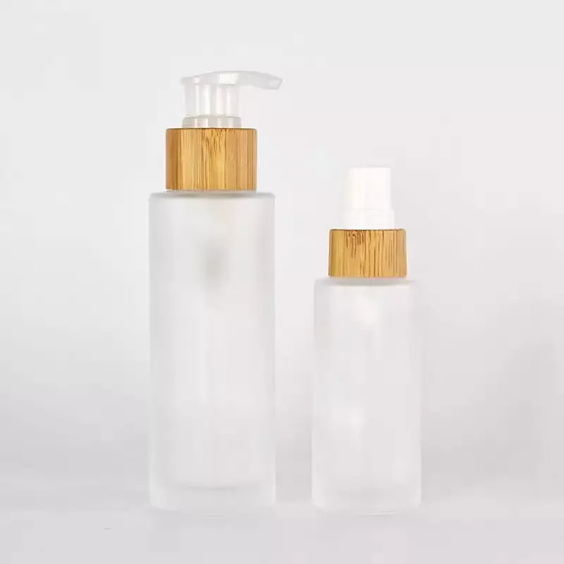 In stock 30ml 50ml 100ml 150ml Round Glass Lotion Bottle with bamboo pump dropper spray Wooden Bamboo cap