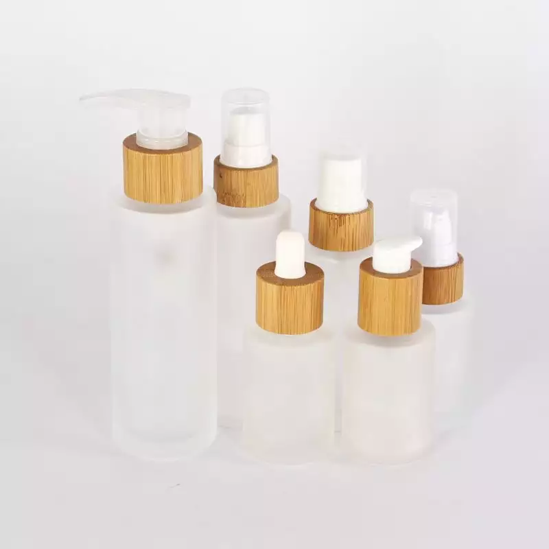 In stock 30ml 50ml 100ml 150ml Round Glass Lotion Bottle with bamboo pump dropper spray Wooden Bamboo cap