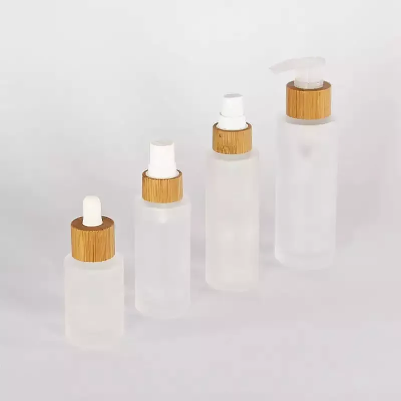 In stock 30ml 50ml 100ml 150ml Round Glass Lotion Bottle with bamboo pump dropper spray Wooden Bamboo cap