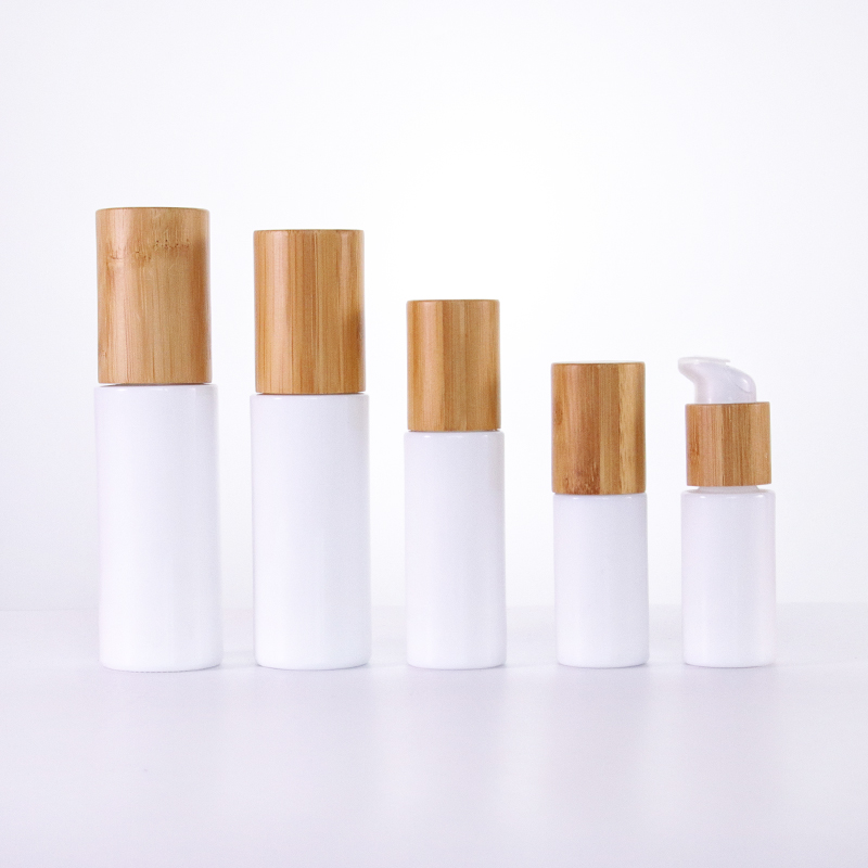 Round glass cosmetic opal glass bottles with wooden lid