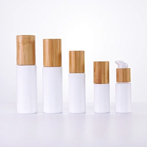 Round glass cosmetic opal glass bottles with wooden lid