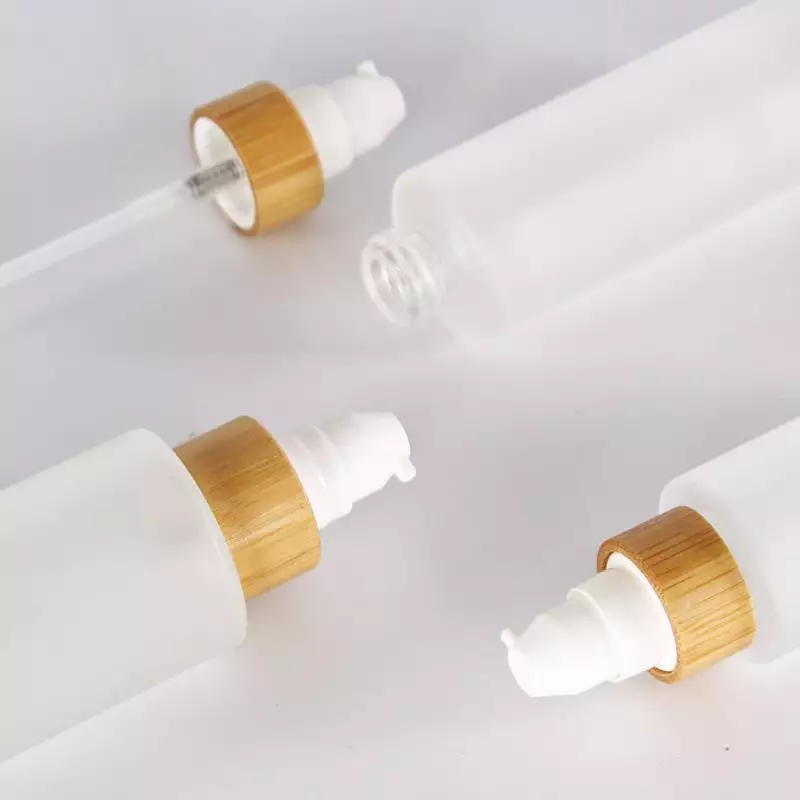 Hot Cosmetic bamboo Packaging 30ml 50ml 100ml 120ml 150ml Frosted Glass Bottle with Bamboo spray pump