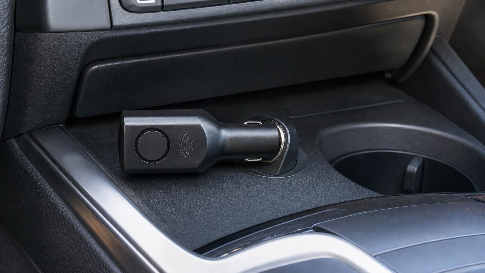 CC001 radar car alarm installed in a 12V vehicle socket during a B2B sample check