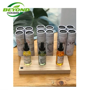 Wholesale Luxury Round Cosmetic Customized Paper Perfume/Essential Oil Packaging For Cosmetics Bottles