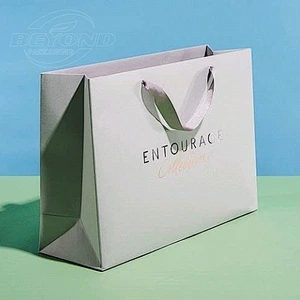 High Quality Eco Friendly Custom Logo Design Kraft Paper Bag Premium Shopping Bag With Ribbon Handle