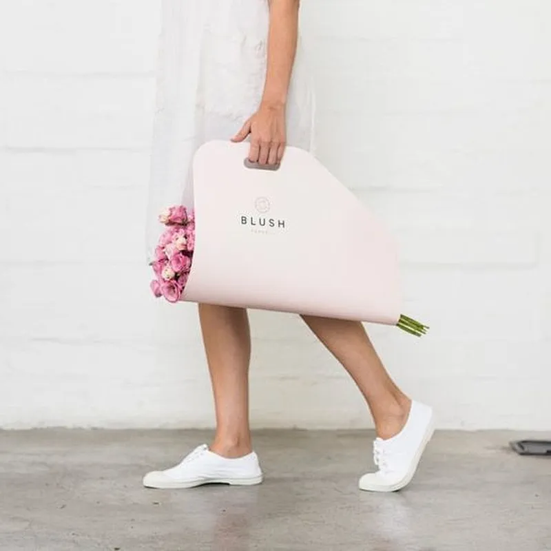 Custom waterproof flower packaging sleeve printing color card paper bag with long ribbon handle