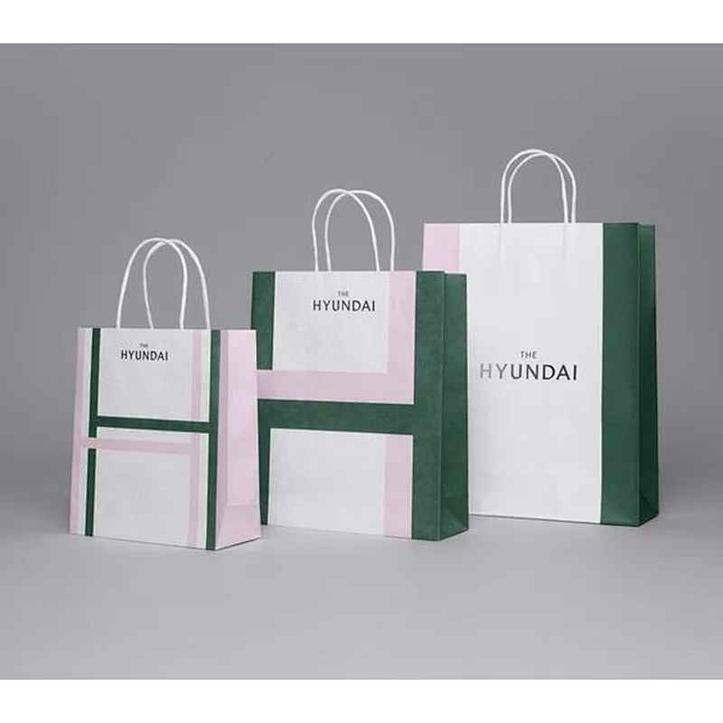 OEM Custom Logo Printed Black Paper Bag Shopping Paper Bags Luxury Clothing Packaging Gift Carrier Bag