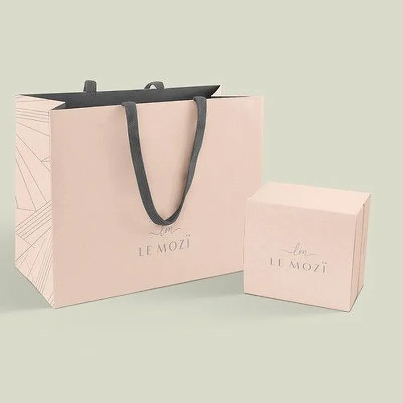 Wholesale Recycled Customized Kraft Paper Bag Packaging Luxury Shopping Gift Clothing Bag With Your Own Logo