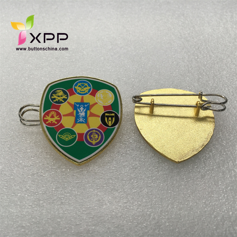 Stylish metal badge with safety pin