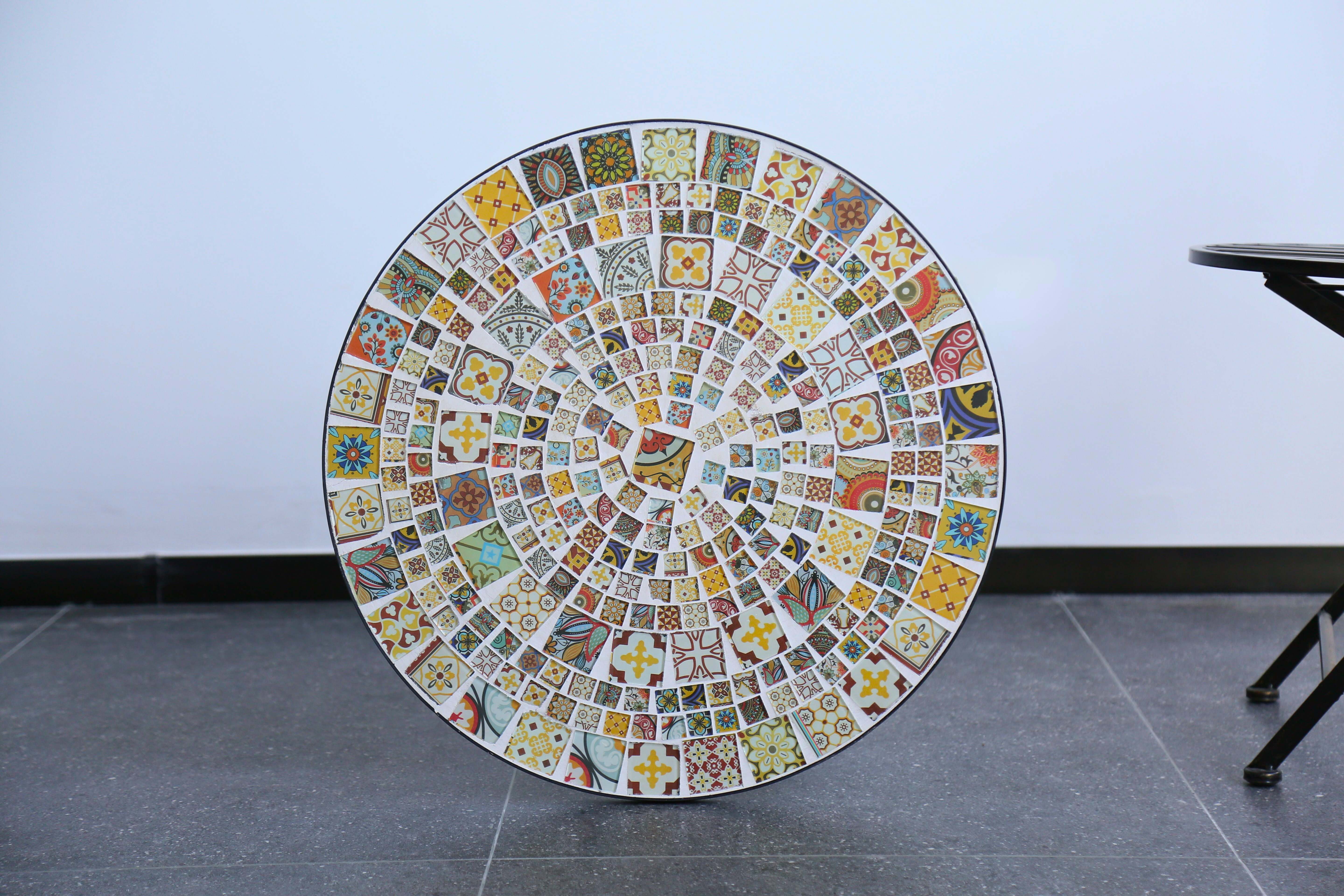 beautiful table with mosaic tale detailing