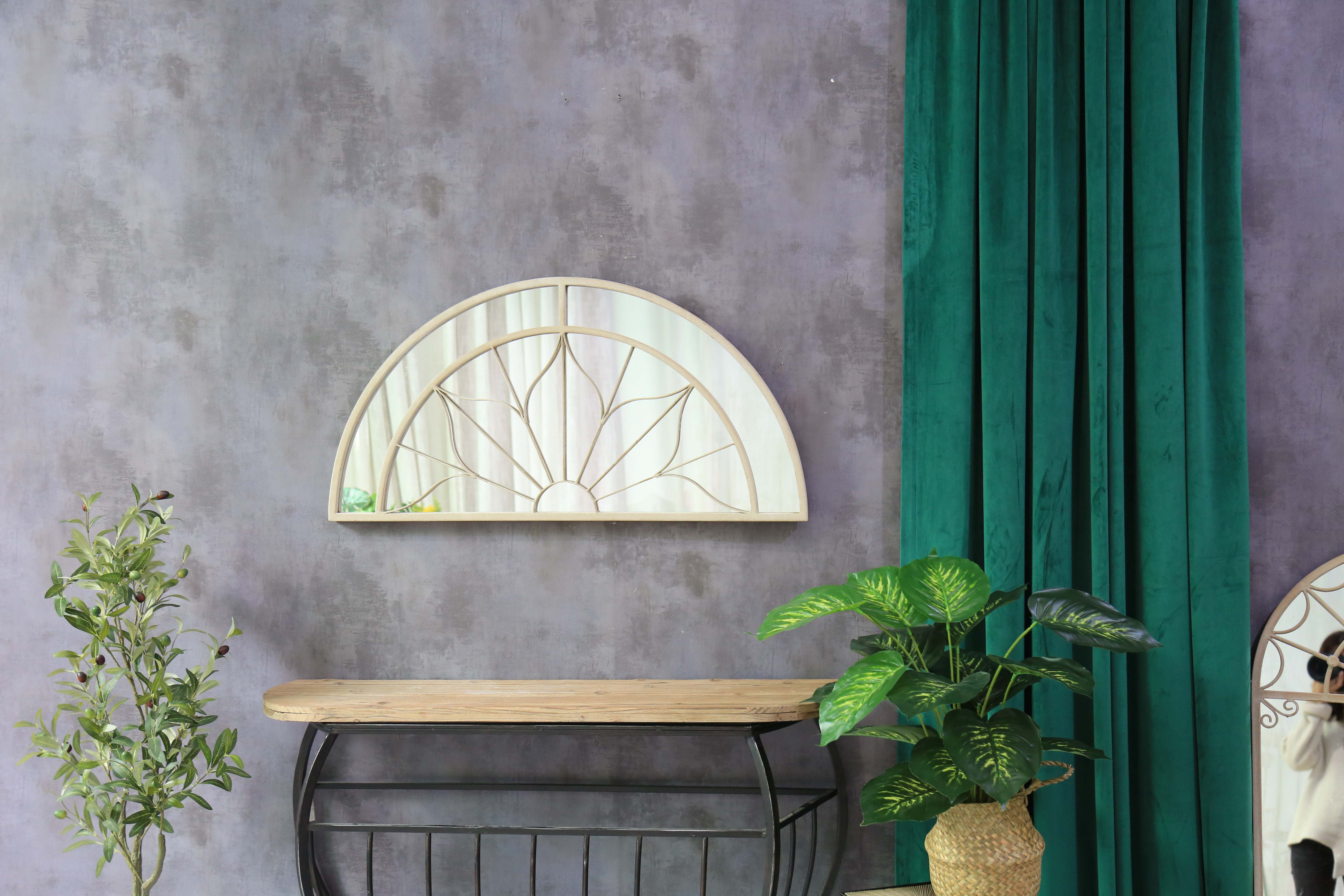 outdoor garden mirrors on showroom wall