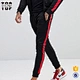 track suit with side stripes
