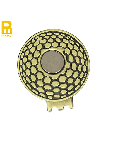 Hat clip and ball marker - a convenient and versatile golf accessory. The hat clip securely holds the ball marker, keeping it within reach during your game. Stay organized and stylish on the course with this essential tool.