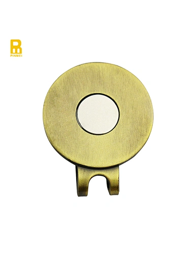 The ball marker hat clip is a convenient and stylish accessory for golfers. It attaches easily to the brim of a hat, allowing players to keep their ball marker within reach at all times.