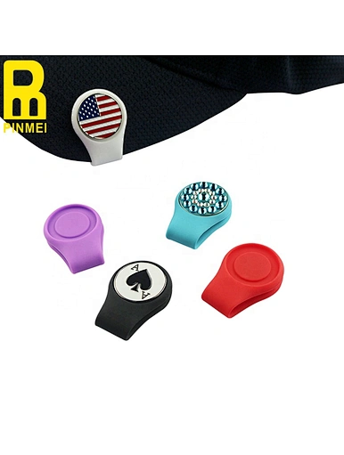 The custom ball marker hat clip is a personalized accessory for golfers. It features a clip that attaches to the brim of a hat, keeping the ball marker easily accessible.