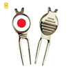 unique divot repair tool