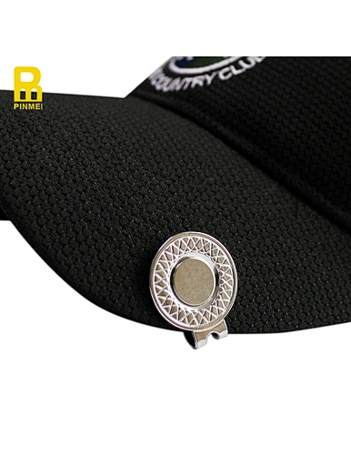 The golf cap clip is a handy accessory to have on the course. It attaches easily to the brim of a hat, keeping a ball marker within reach. Made with sturdy materials, it blends in well with any outfit.