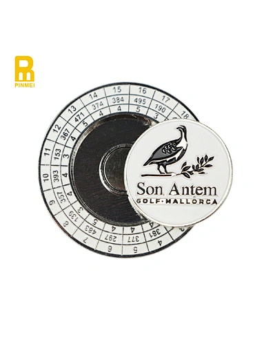 A poker chip with a removable ball marker is a versatile accessory for golfers. This round chip, resembling a poker chip, has a detachable ball marker that can be easily removed and placed on the green to mark the position of a golf ball.