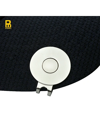 The custom golf ball marker hat clip is a personalized accessory for golf enthusiasts. It features a hat clip with a custom design, allowing golfers to showcase their unique style on the course.