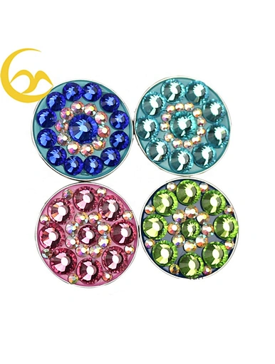 Swarovski golf ball markers are luxurious accessories used to mark a golfer's ball on the green. These markers are adorned with sparkling Swarovski crystals, adding a touch of elegance and glamour to the game.