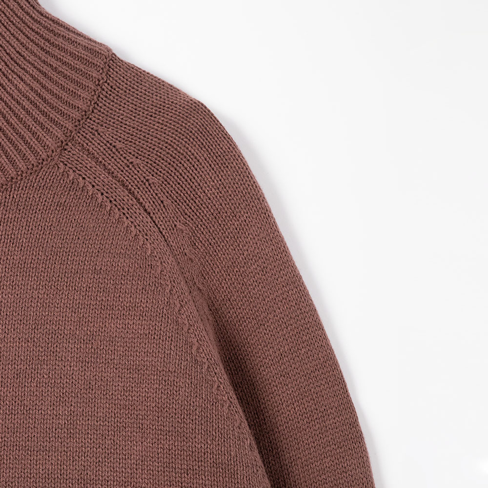 minimalist neutral-toned everyday quarter-zip sweater shoulder detail
