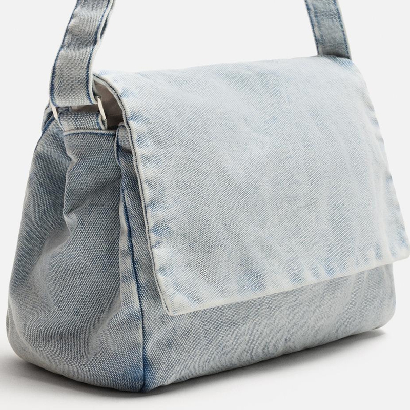 washed denim crossbody bag 45° angled view details