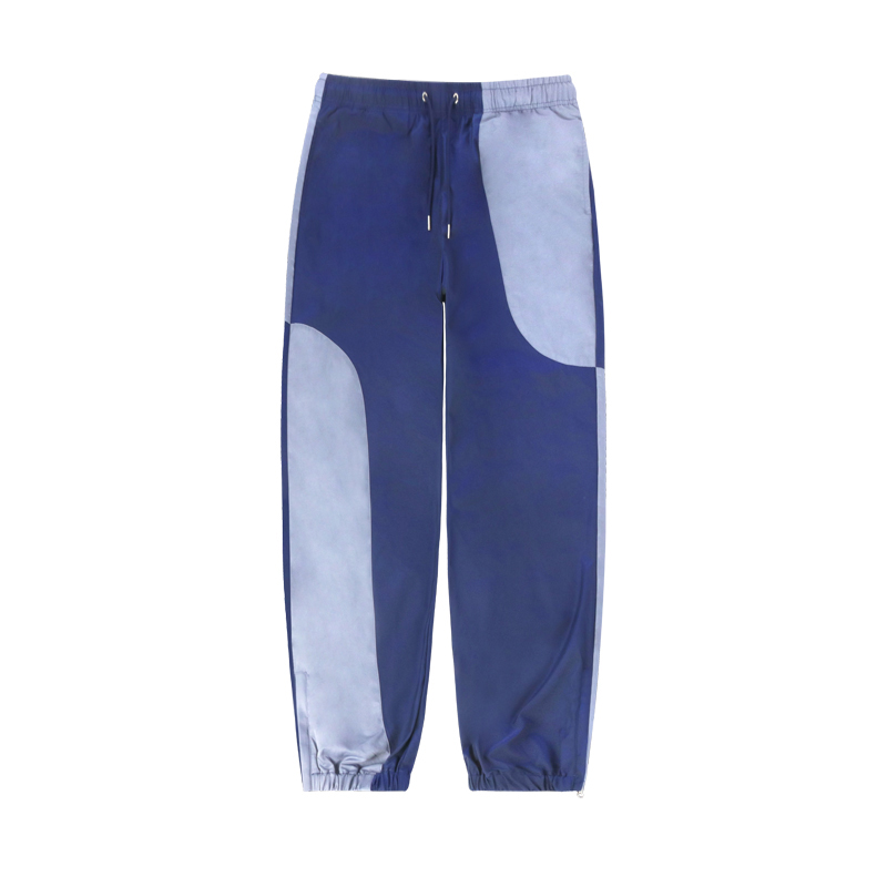 blue color block nylon track pants front view