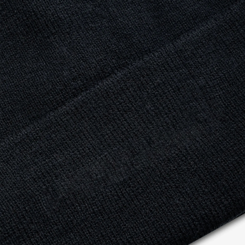 black knit cuffed beanie knit texture detail custom winter headwear manufacturer