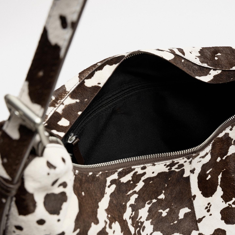 cow print shoulder bag interior detail