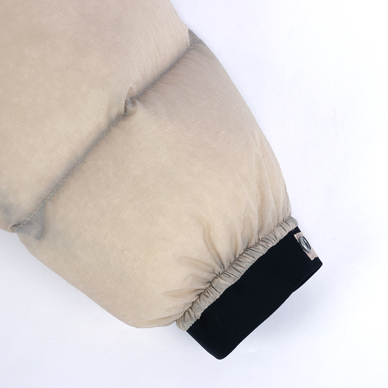 custom deconstructed puffer jacket sleeve detail view