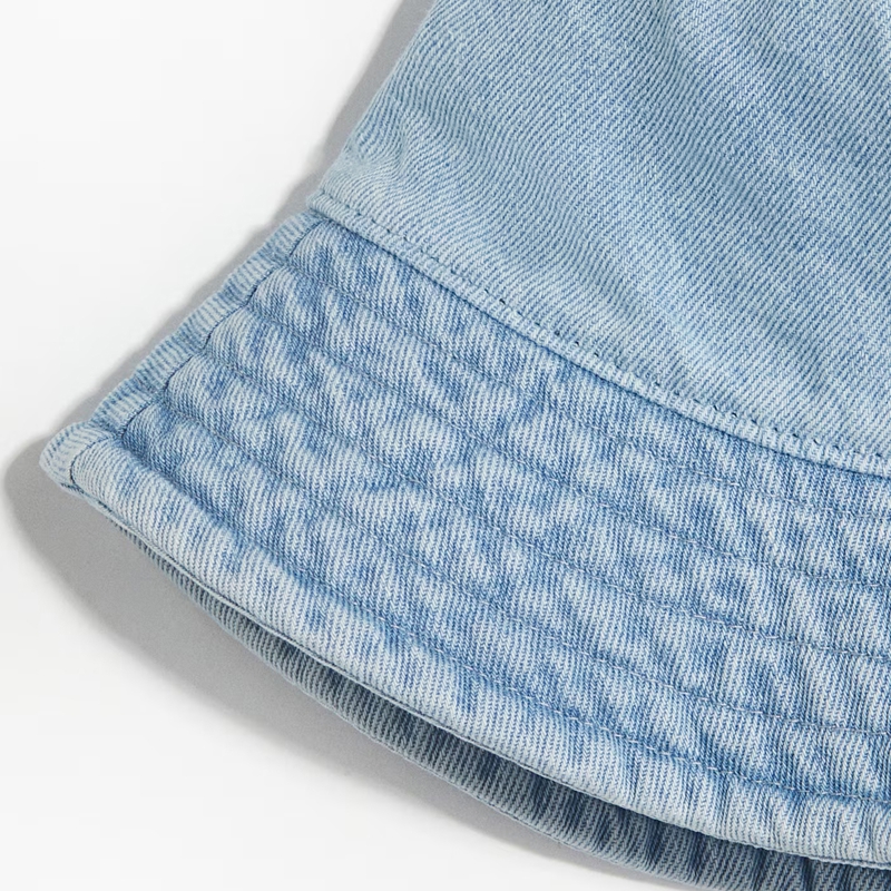 washed denim bucket hat side view