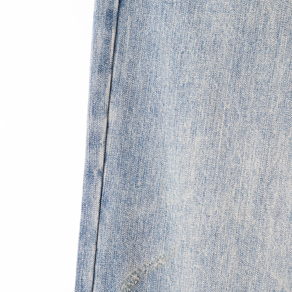 distressed denim trousers texture detail