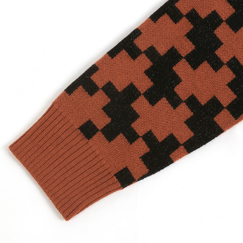 oversized retro-inspired geometric pattern knit sweater sleeve detail