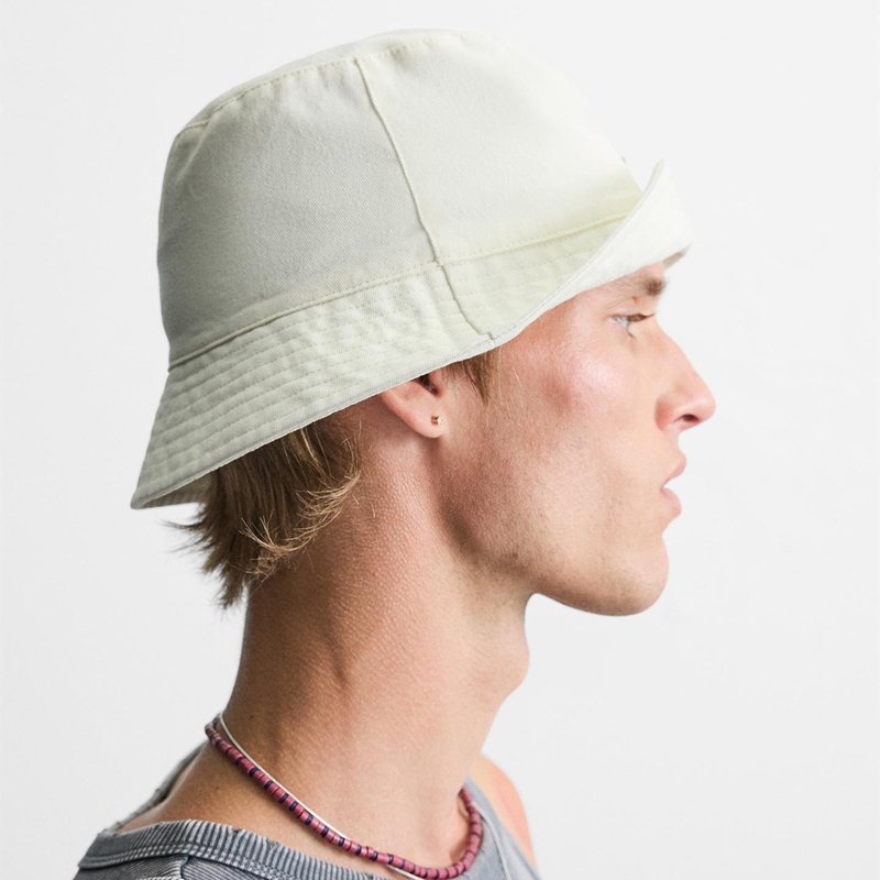 minimalist neutral-tone bucket hat side view