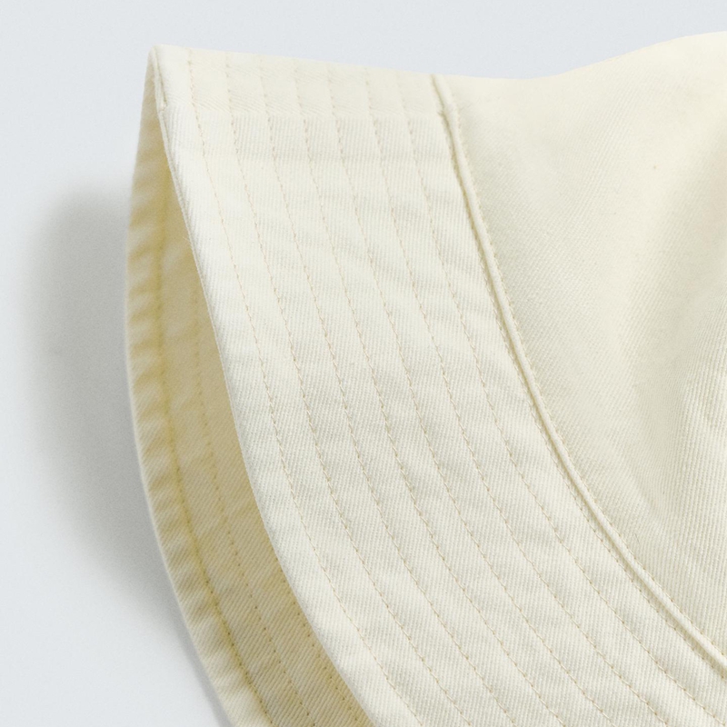 cream cotton bucket hat partial details shot