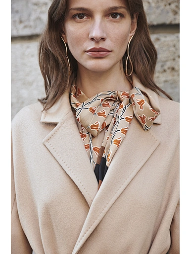 Mid-length beige waist-skimming wool coat