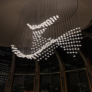 Modern luxury dining hotel lobby large wedding ceiling lights chandeliers