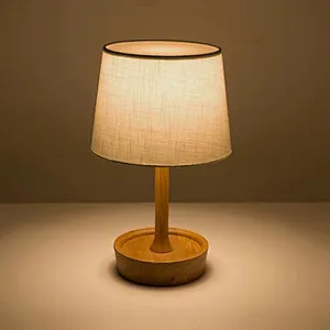 Adjustable wooden table lamp with parchment shade