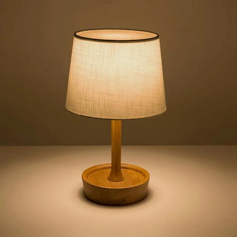 Adjustable wooden table lamp with parchment shade